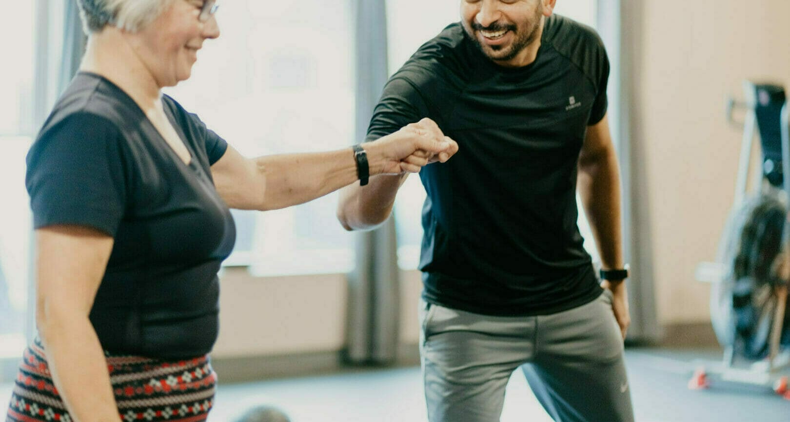 Senior member with coach at Sports Center Performance Zone